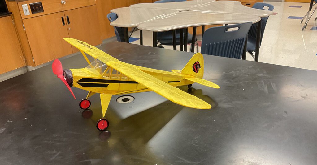 STEM Piper Cub model kit build by student
